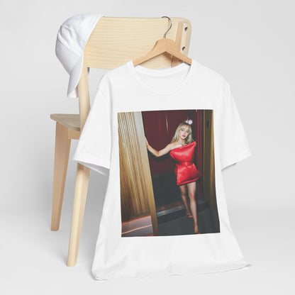 A black graphic t-shirt featuring a graphic of Sabrina Carpenter with 'hot pop vibes'.
