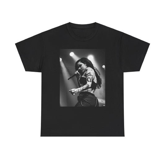 A black graphic t-shirt featuring a glamorous graphic or photo of Kehlani performing on stage.