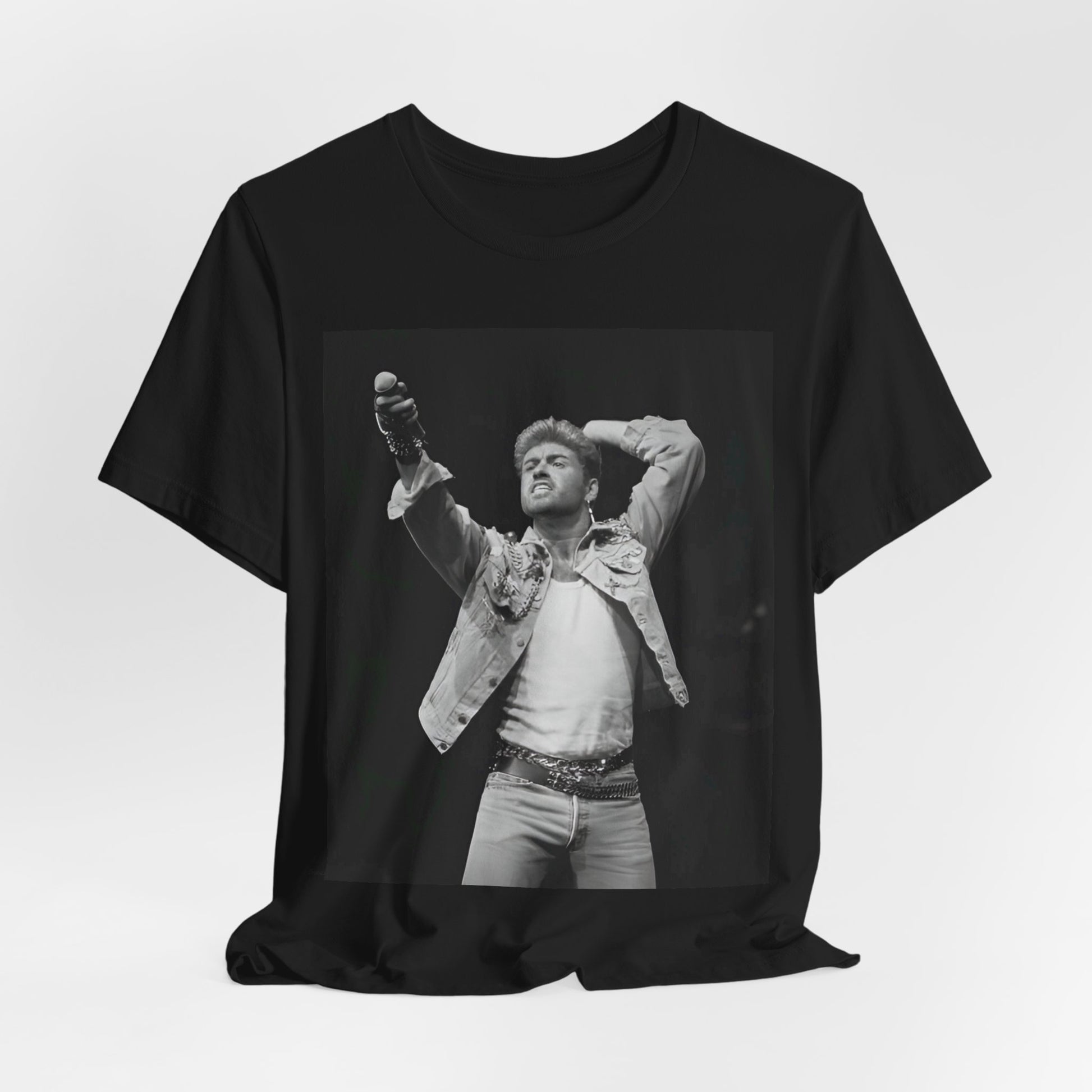 A black graphic t-shirt featuring a graphic or photo of George Michael performing live on stage.