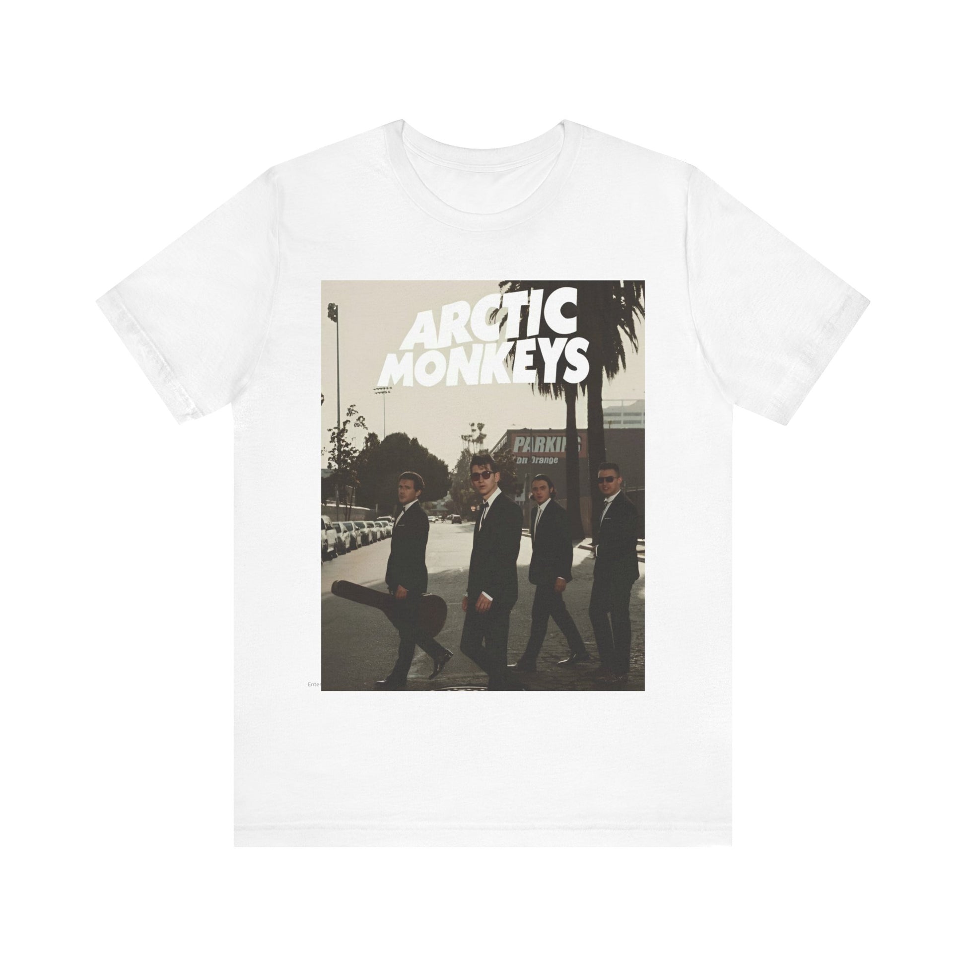 A black graphic t-shirt featuring Arctic Monkeys in a pose or setting similar to the iconic 'Abbey Road' album cover.