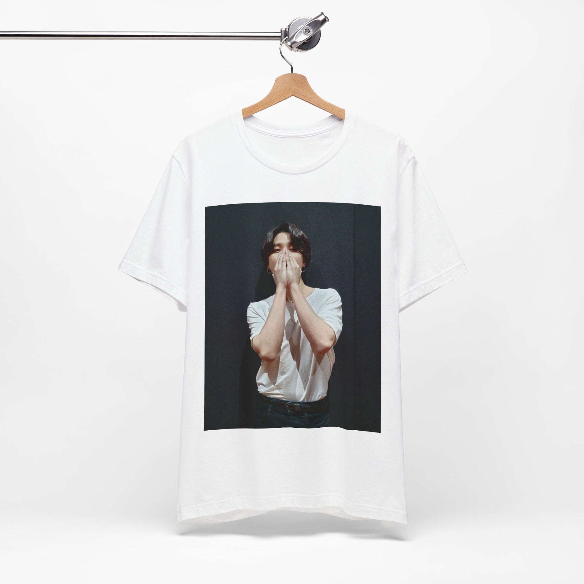 A black graphic t-shirt featuring a graphic of Jimin designed for everyday K-Pop style.