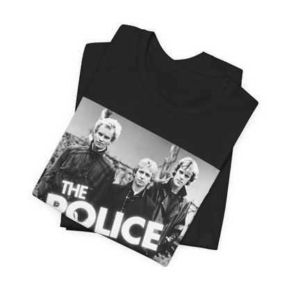 A black graphic t-shirt featuring an 80s pop rock aesthetic black and white graphic of The Police.