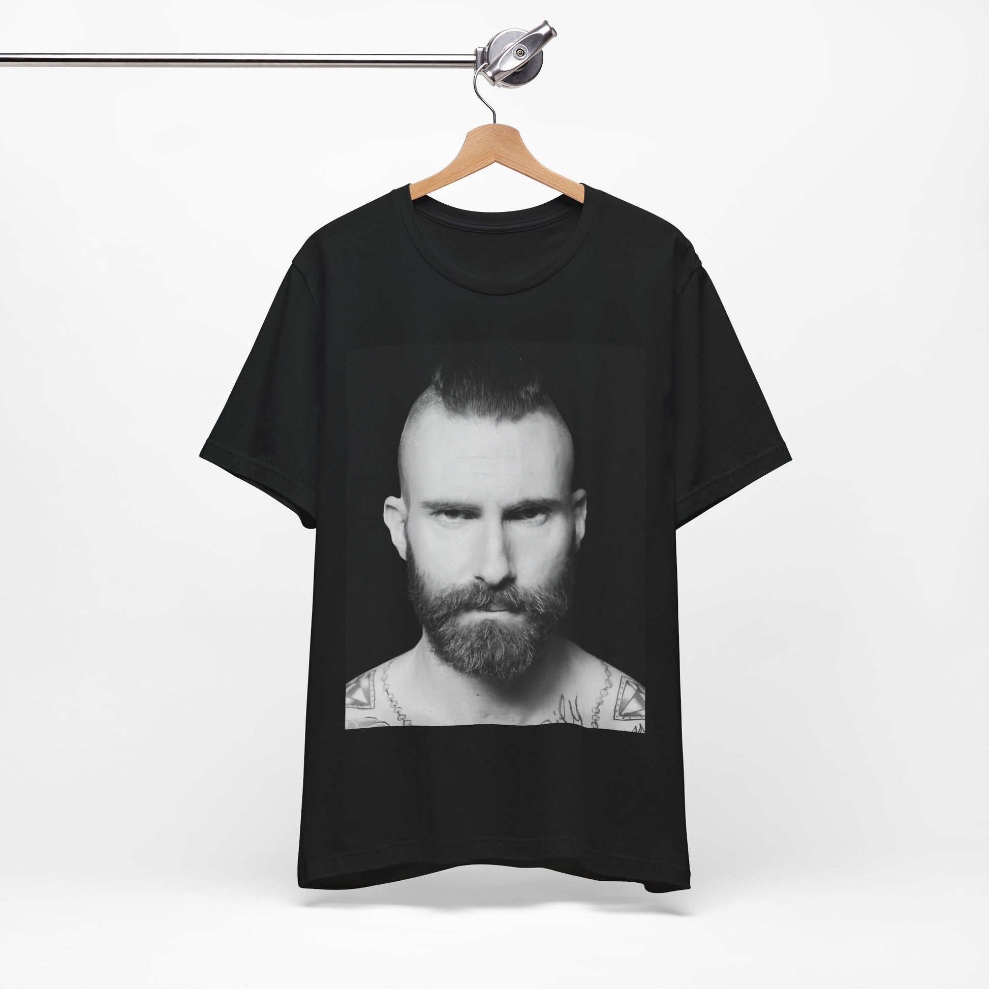 A sharp, polished studio portrait of Maroon 5 frontman Adam Levine, printed on a graphic t-shirt.