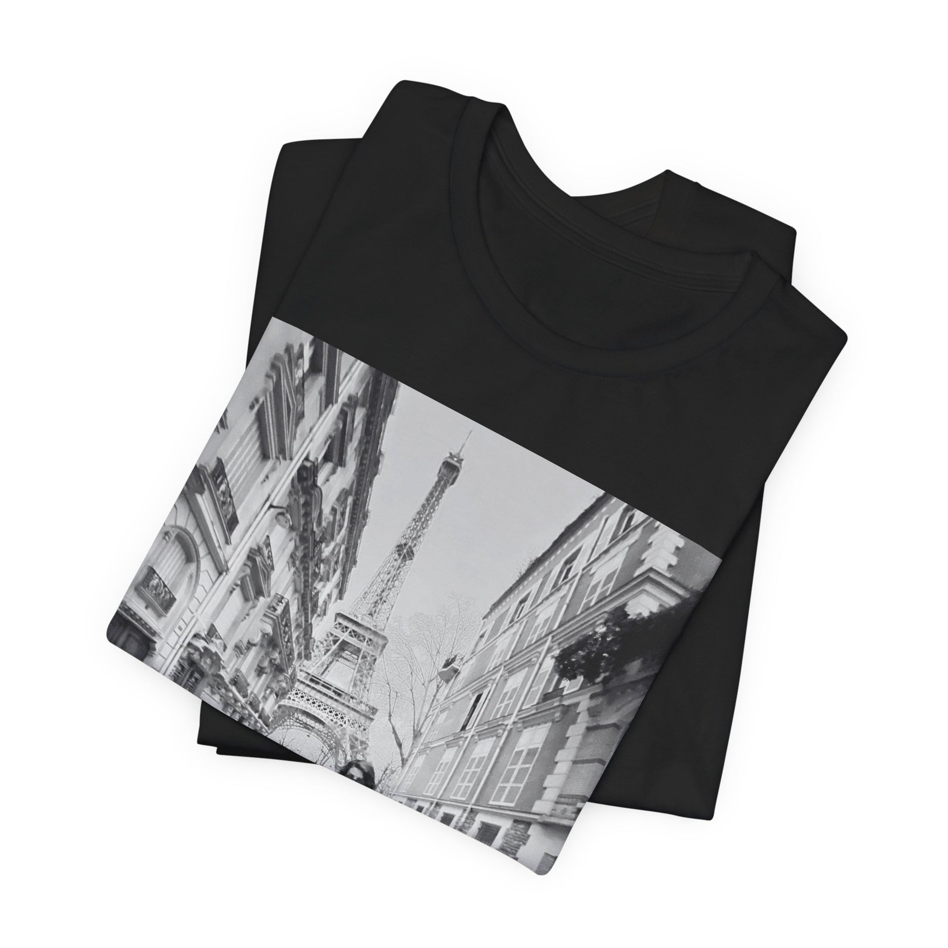 A black graphic t-shirt featuring a black and white photo of Selena Gomez in Paris.