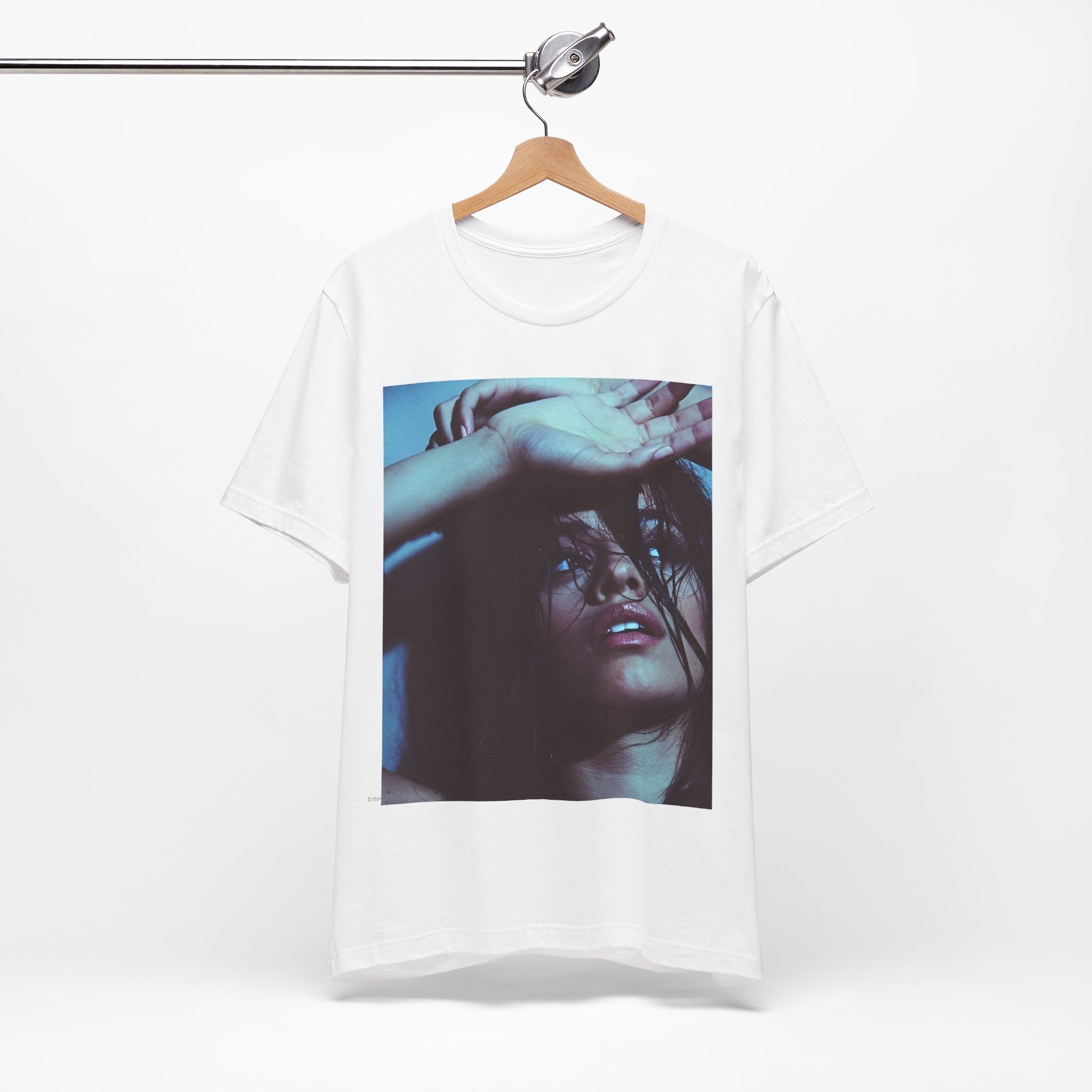 A black graphic t-shirt featuring a graphic related to Camila Cabello's "Señorita" song, possibly with dance-inspired elements.