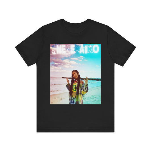 A black graphic t-shirt featuring a vintage ethereal R&B graphic of Jhene Aiko.