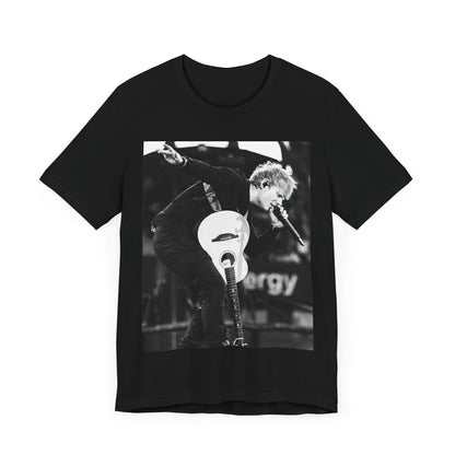 A black graphic t-shirt featuring a vintage graphic of Ed Sheeran performing live.