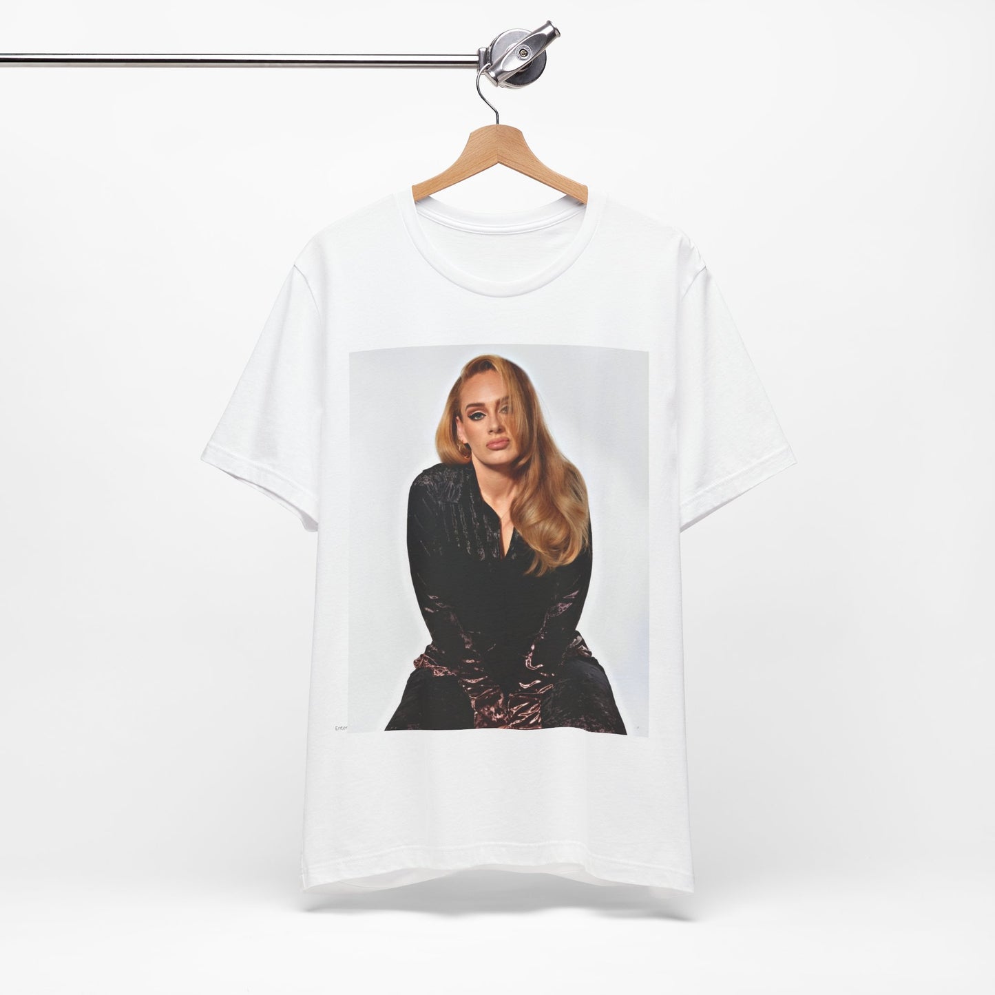 A black graphic t-shirt featuring a portrait of Adele from her iconic blonde era, with her hair styled and her expression poised and elegant.