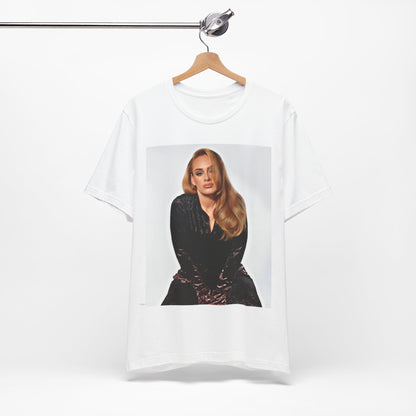 A black graphic t-shirt featuring a portrait of Adele from her iconic blonde era, with her hair styled and her expression poised and elegant.