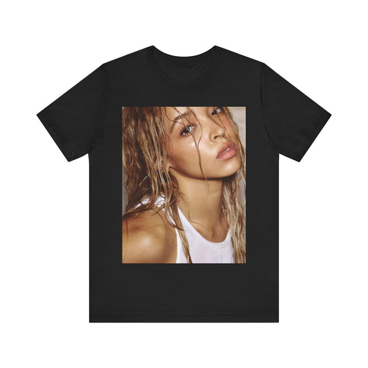 A black graphic t-shirt featuring a nostalgic indie R&B vibes graphic of Tinashe.