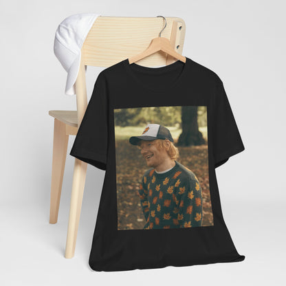 A black graphic t-shirt featuring a graphic related to Ed Sheeran's 'Shape of You' song or era.