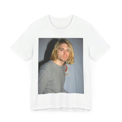 A black graphic t-shirt featuring a 90s photo portrait of Kurt Cobain from Nirvana.