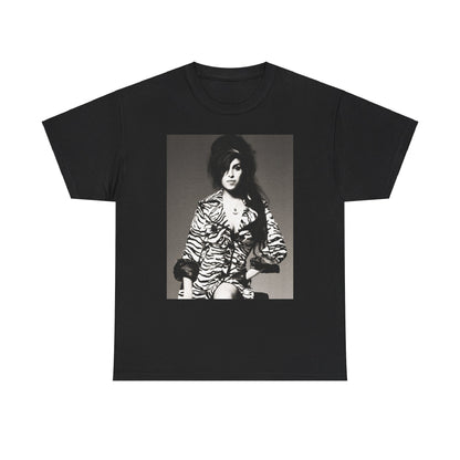 A black graphic t-shirt featuring a vintage black and white portrait of Amy Winehouse, showing her with her signature beehive and soulful expression.