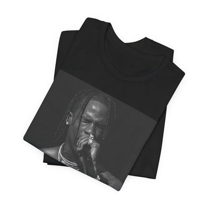 A black graphic t-shirt featuring an underground hip hop graphic of Travis Scott.