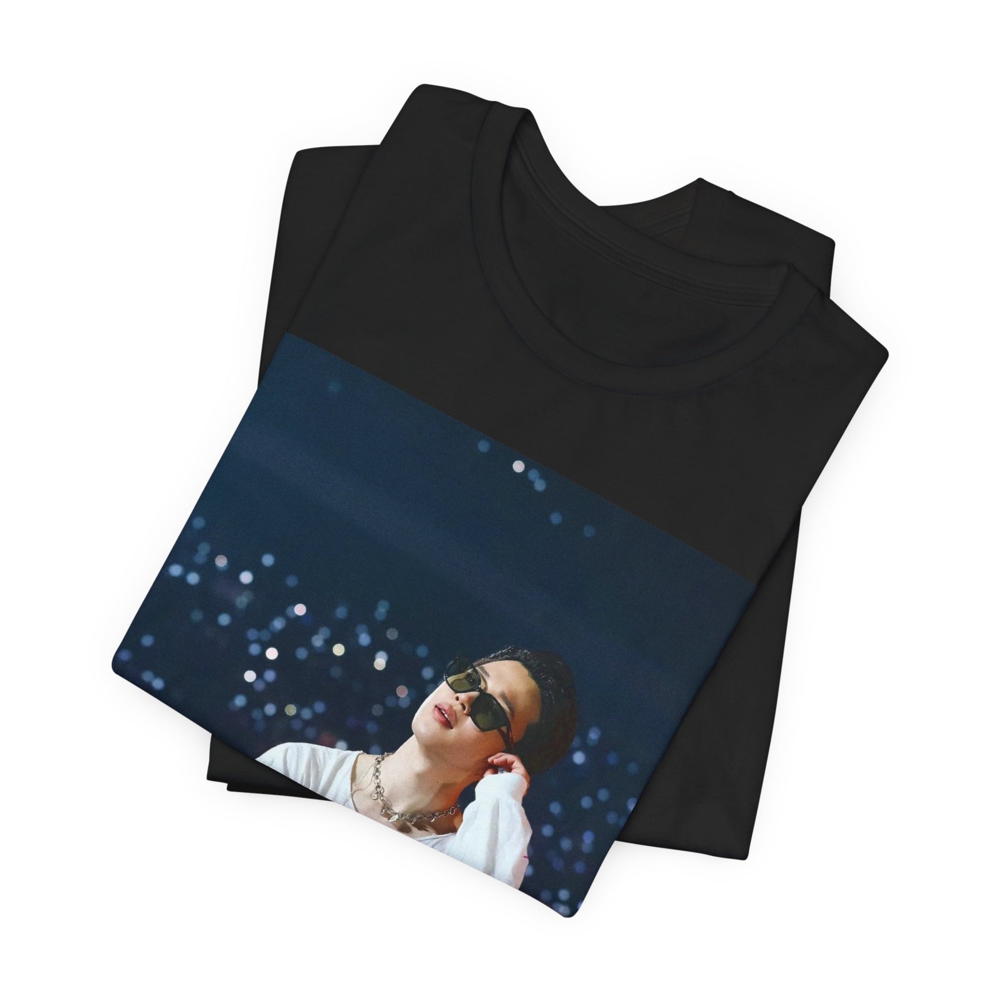 A black graphic t-shirt featuring a vintage aesthetic graphic related to Jimin's 'Lie' era.
