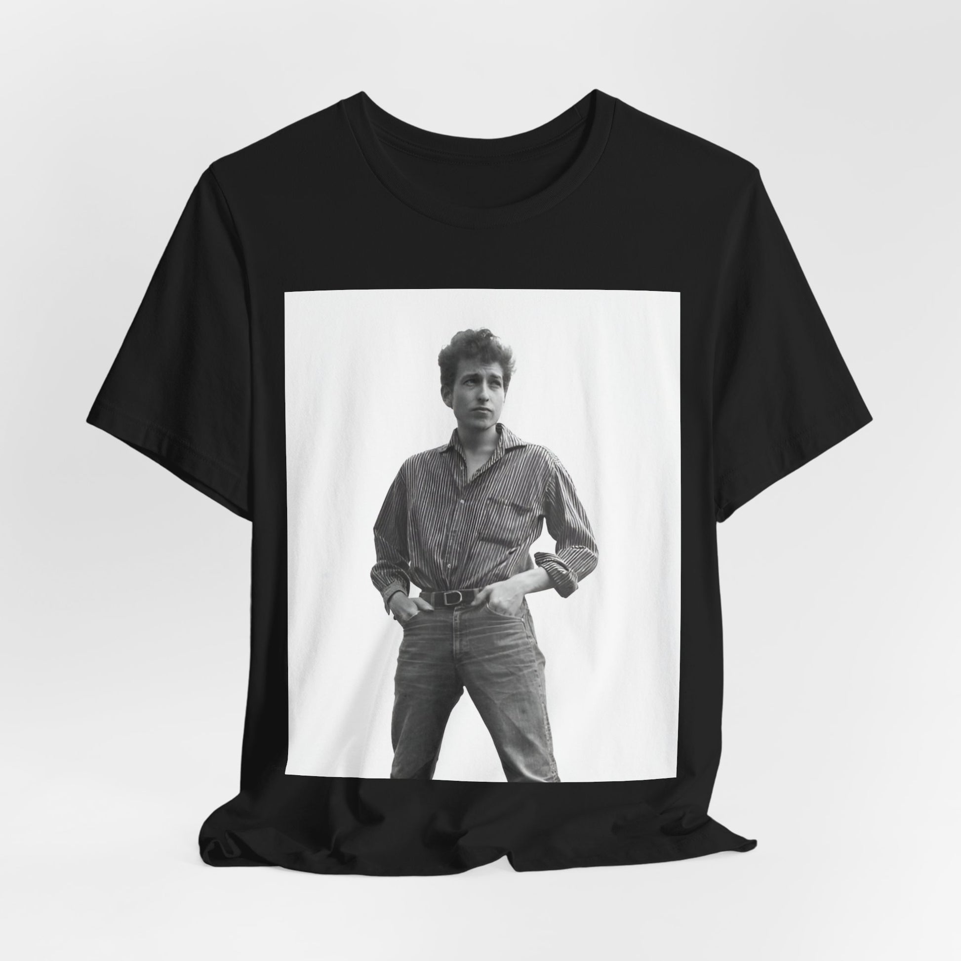 A black graphic t-shirt featuring a vintage 60s folk aesthetic graphic of Bob Dylan.