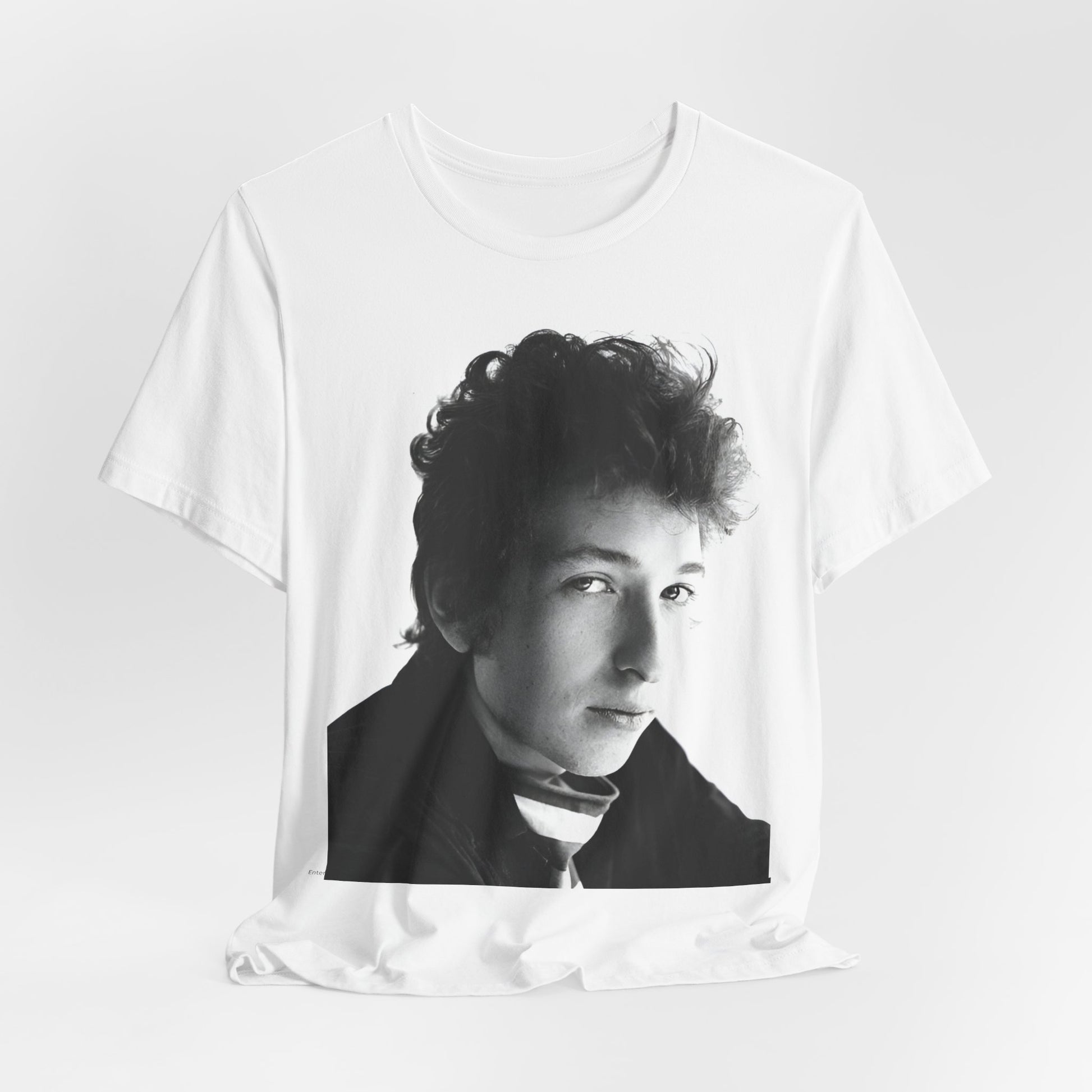 A black graphic t-shirt featuring a graphic related to Bob Dylan's 'Like a Rolling Stone' song or era.