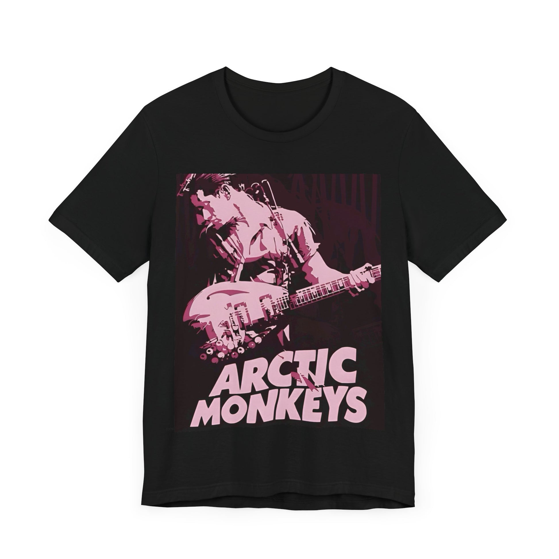 A black graphic t-shirt featuring the Arctic Monkeys logo in a prominent pink color, creating an aesthetic look.