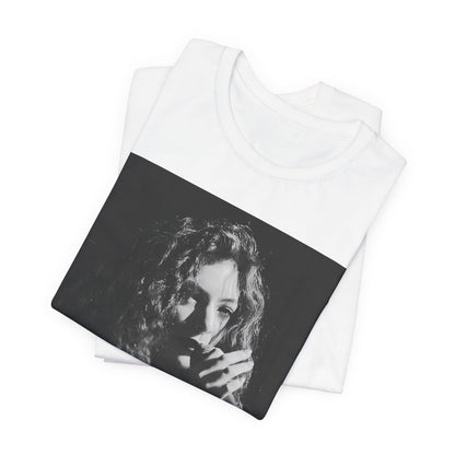 A black graphic t-shirt featuring a graphic or photo of Lorde performing live.