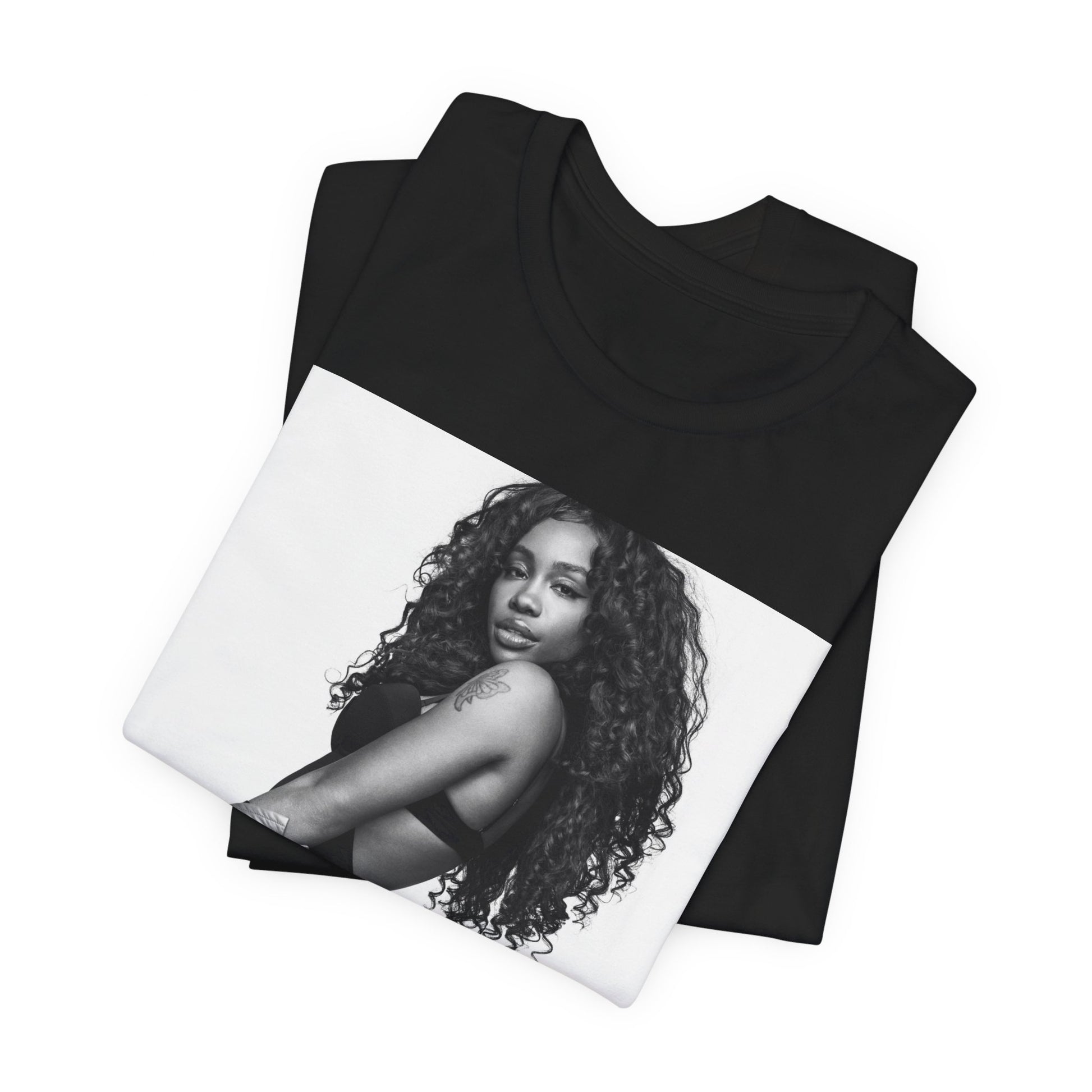 A black graphic t-shirt featuring a black and white portrait photo of SZA.