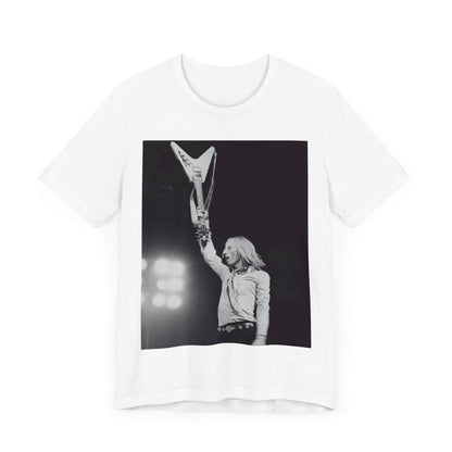 A black graphic t-shirt featuring a graphic or photo of Tom Petty playing guitar on stage.