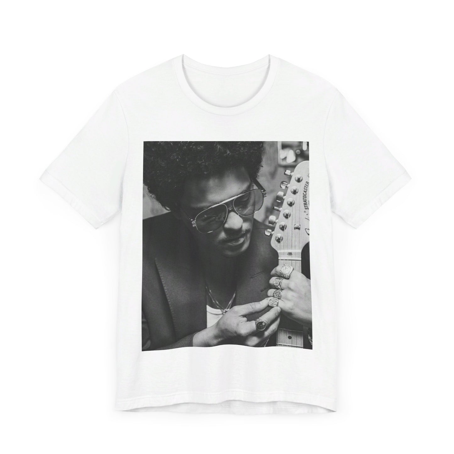 A black graphic t-shirt featuring a graphic of Bruno Mars in a classic crooner style.