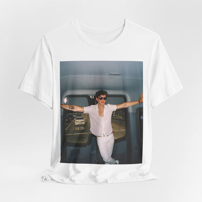A black graphic t-shirt featuring a graphic of Shawn Mendes with a classic confident look.