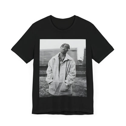 A black graphic t-shirt featuring a graphic related to Tupac's 'Thug Life' philosophy.