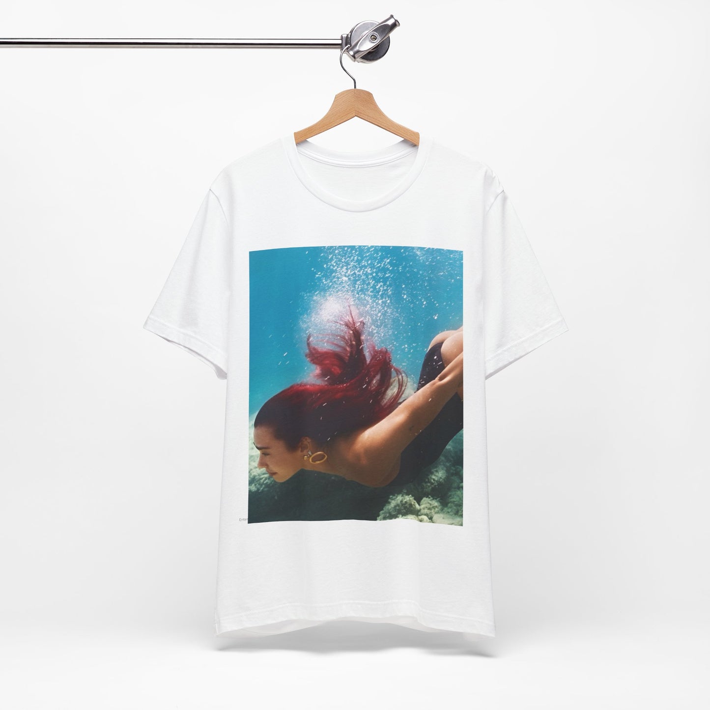 A black graphic t-shirt featuring a graphic related to Dua Lipa's 'Radical Optimism' album.
