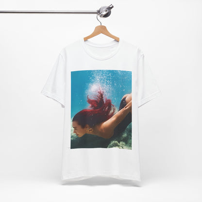 A black graphic t-shirt featuring a graphic related to Dua Lipa's 'Radical Optimism' album.
