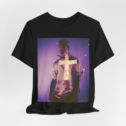 A black graphic t-shirt featuring a graphic of Travis Scott with dark fantasy vibes.