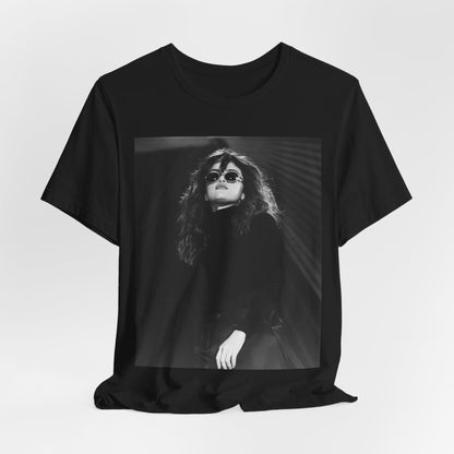 A black graphic t-shirt featuring a black and white, monochrome graphic or photo of Selena Gomez.