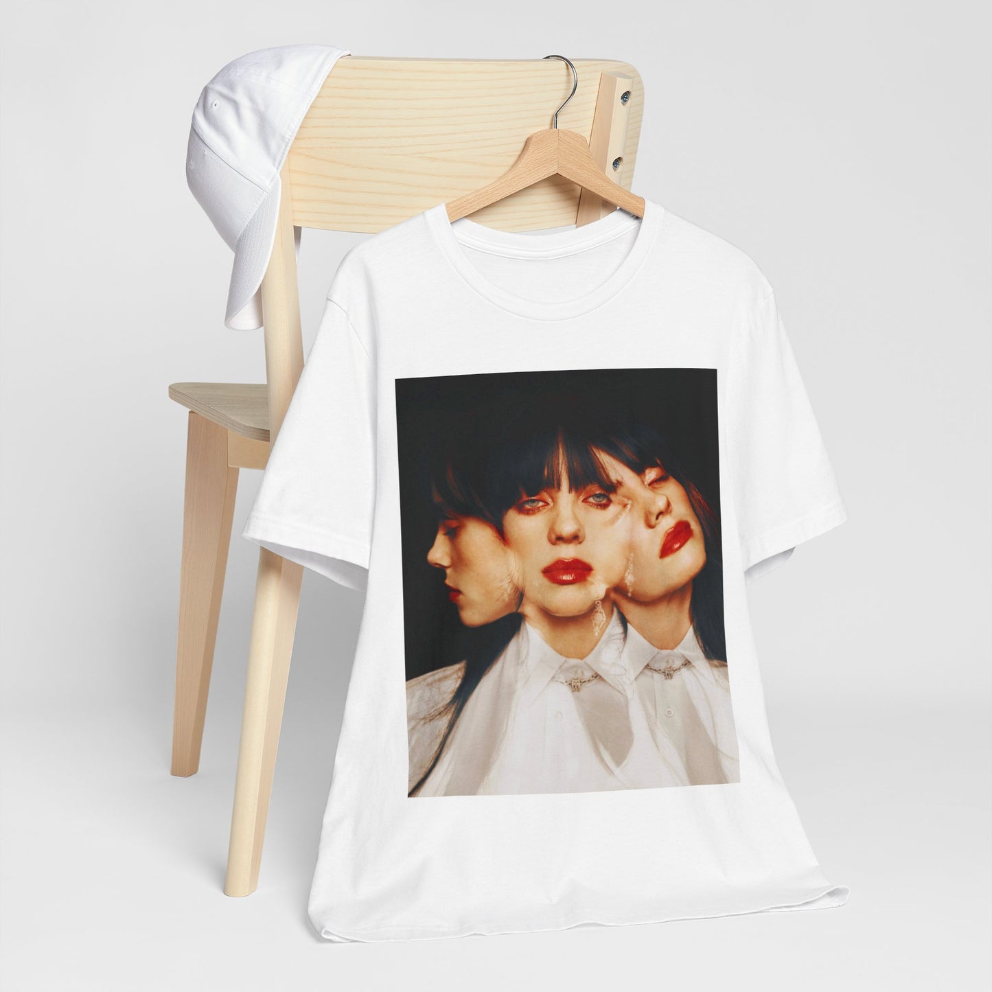 A classic, glamorous portrait of Billie Eilish as a pop star, with blonde hair and a confident gaze, printed on a t-shirt.