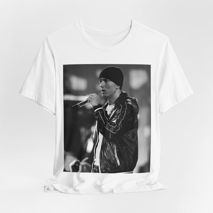 A black graphic t-shirt featuring a classic 90s graphic of Eminem as a 'Rap God'.