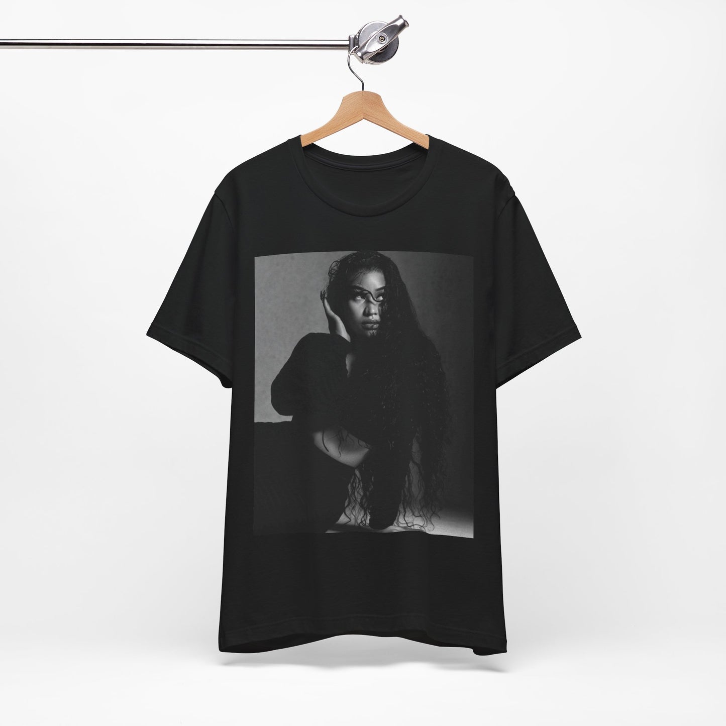 A black graphic t-shirt featuring a black and white graphic or photo of Nicki Minaj as a glamour queen.