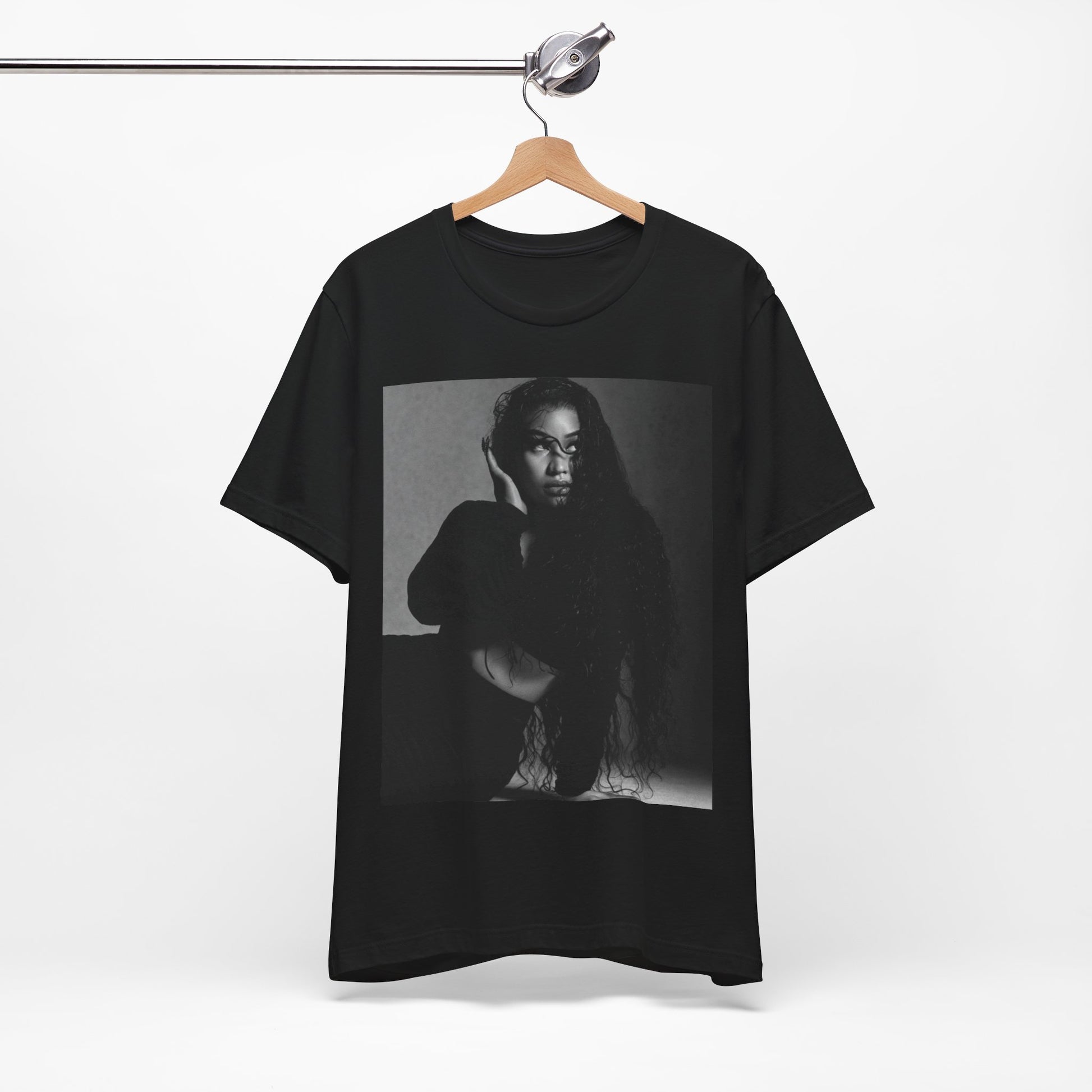 A black graphic t-shirt featuring a black and white graphic or photo of Nicki Minaj as a glamour queen.