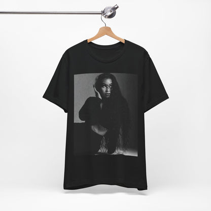 A black graphic t-shirt featuring a black and white graphic or photo of Nicki Minaj as a glamour queen.