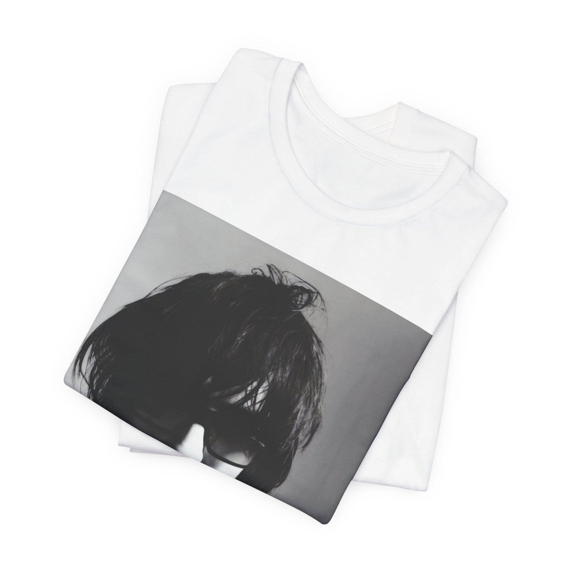 A black graphic t-shirt featuring a graphic related to The Strokes' 'Reptilia' song or era.