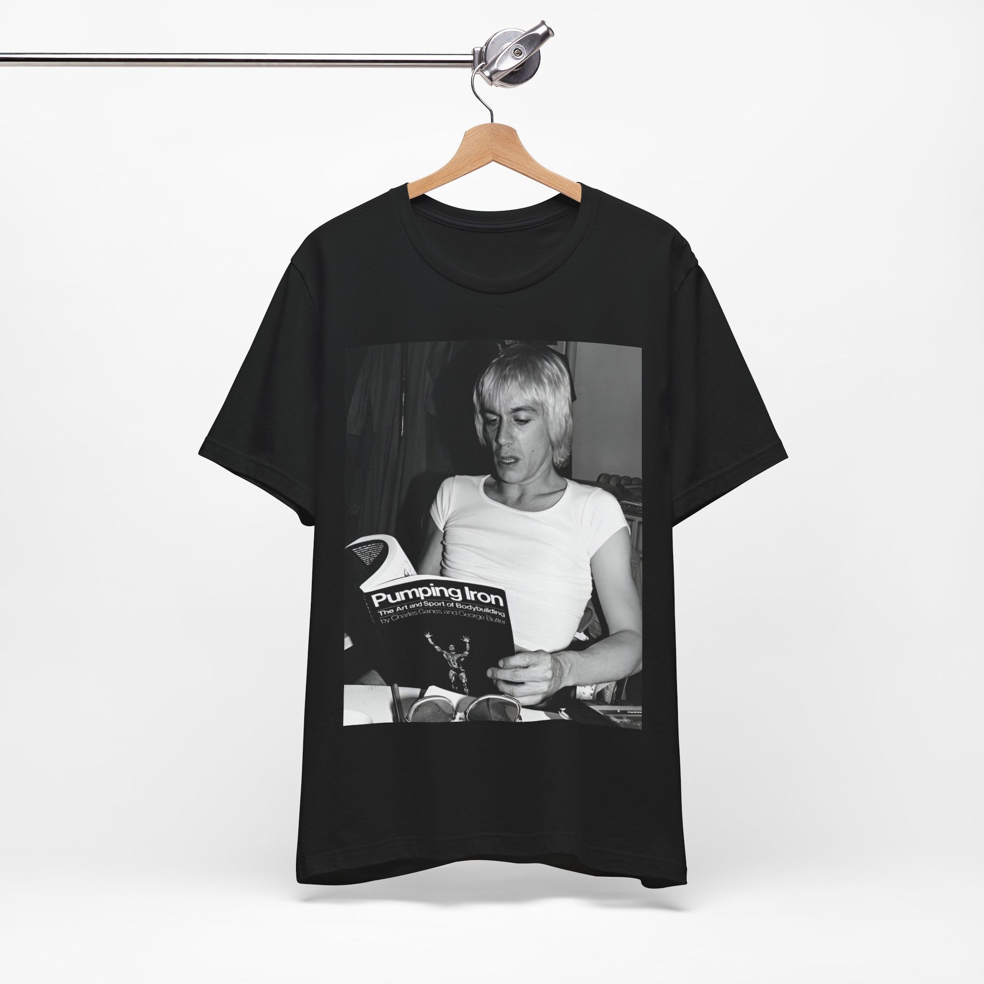 A black graphic t-shirt featuring a 70s classic photo of Iggy Pop and The Stooges.