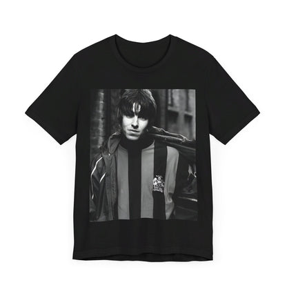 A black graphic t-shirt featuring a photo of Liam Gallagher from Oasis, showing his support for Manchester City.