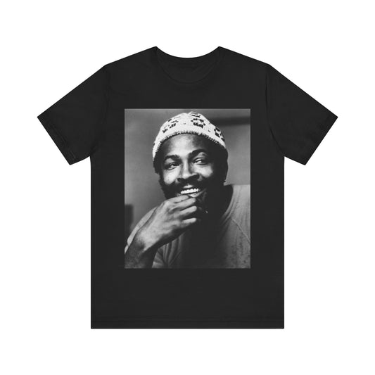 A black graphic t-shirt featuring a 70s retro portrait graphic of Marvin Gaye.