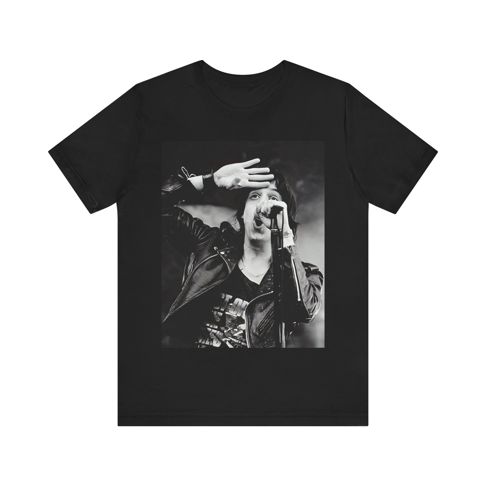 A black graphic t-shirt featuring a black and white portrait photo of The Strokes band.