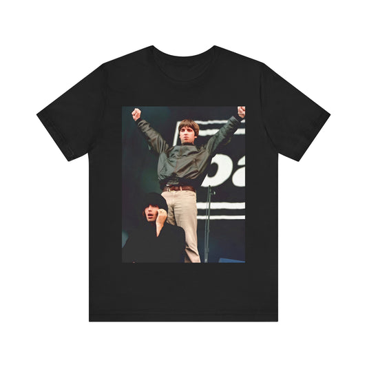 A black graphic t-shirt featuring a graphic or photo of Liam and Noel Gallagher from Oasis performing live on stage.