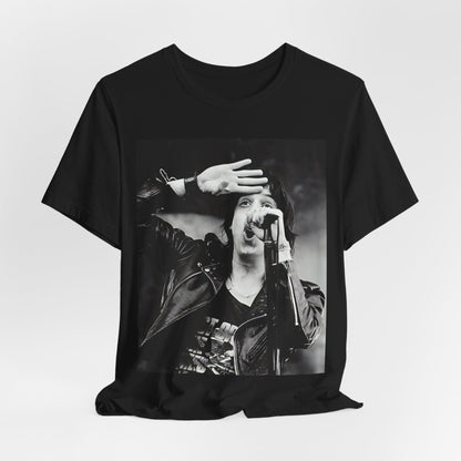A black graphic t-shirt featuring a black and white portrait photo of The Strokes band.