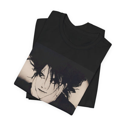 A black graphic t-shirt featuring a graphic of The Cure with cool new wave vibes.