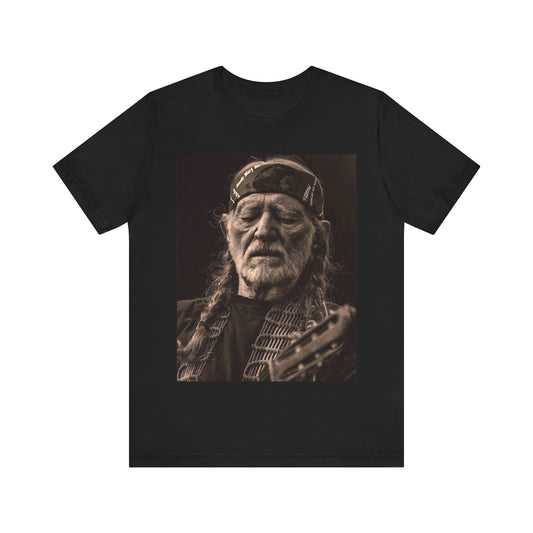 A black graphic t-shirt featuring a graphic of Willie Nelson with his iconic braids style.