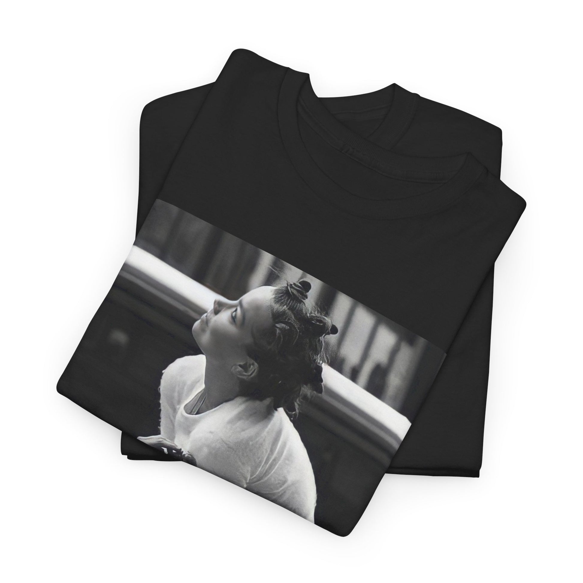 A black graphic t-shirt featuring a graphic of Bjork as an experimental pop icon.