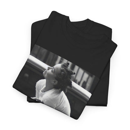 A black graphic t-shirt featuring a graphic of Bjork as an experimental pop icon.
