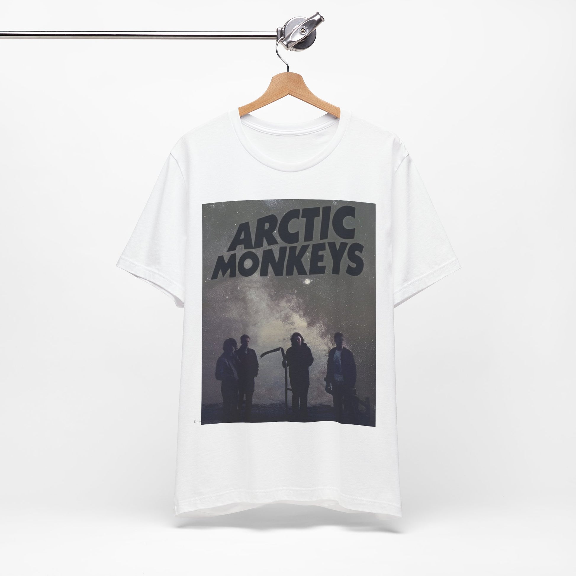 A black graphic t-shirt featuring an artistic or aesthetic graphic of the Arctic Monkeys band.