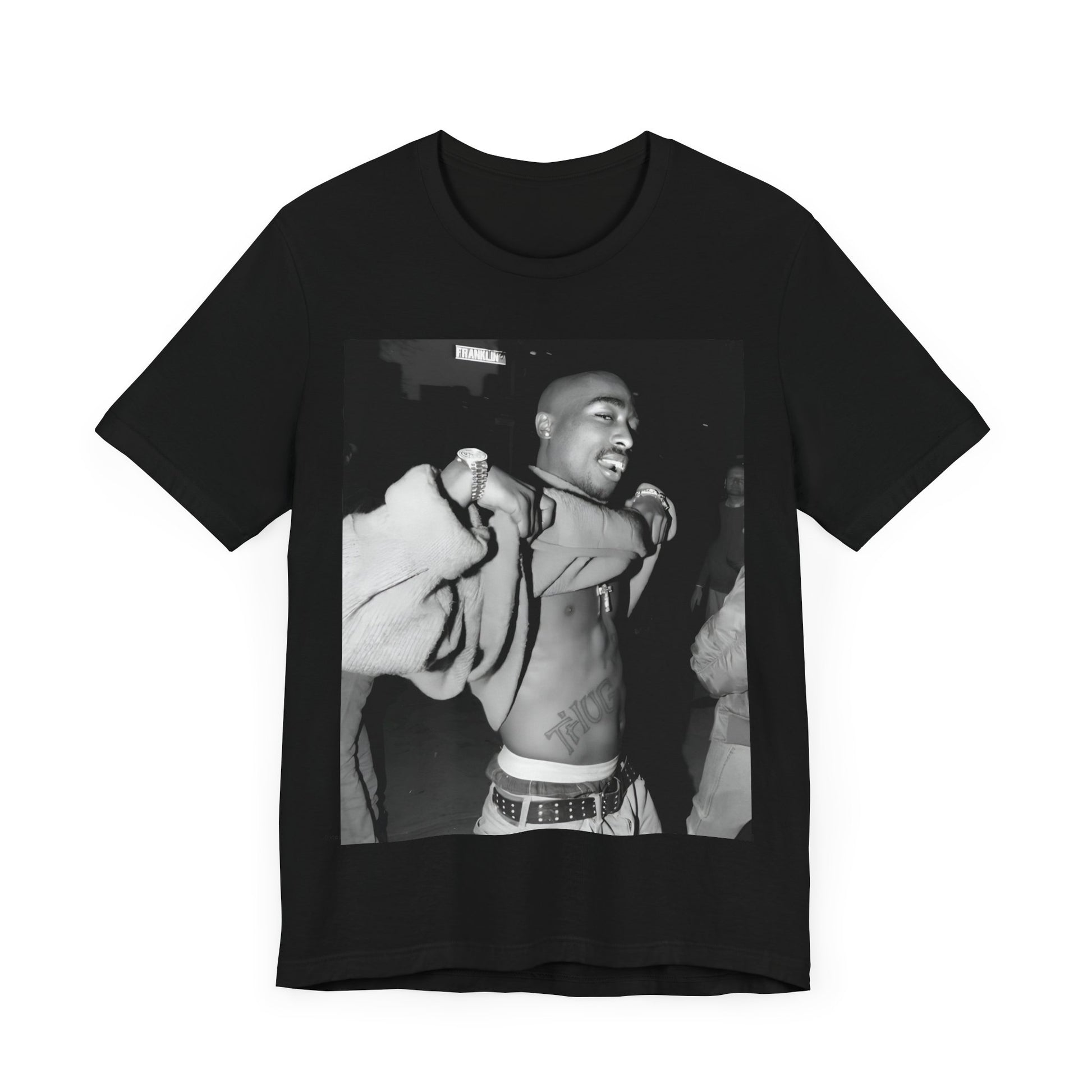 A black graphic t-shirt featuring a vintage hip hop icon graphic of Tupac.